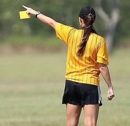 How do Soccer Referees Communicate with Players